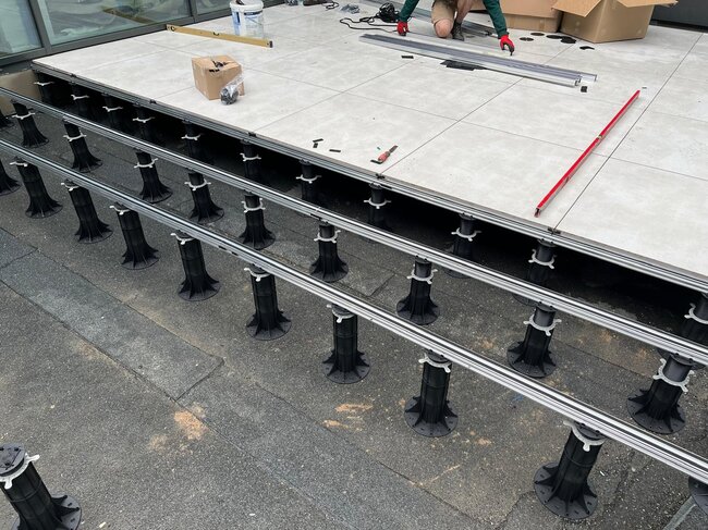 installation of an adjustable pedestal substructure and alum