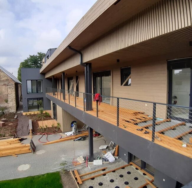 adjustable paving pedestals supporting raised wooden balcony